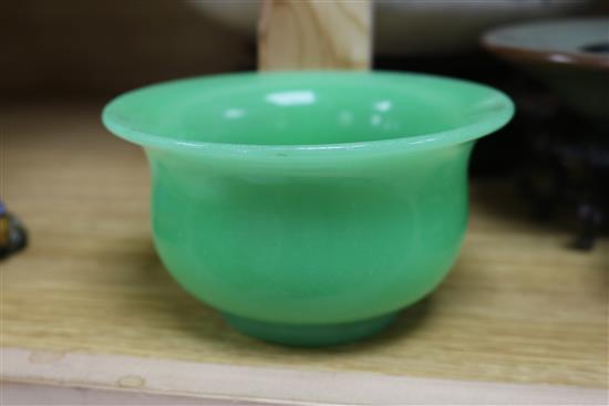 Three Chinese hardwood stands and three bowls